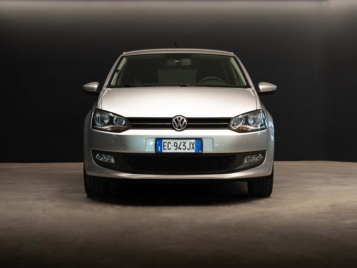 Car rental in Val Pusteria/Pustertal, Dolomites Silver Volkswagen car front view on dark background